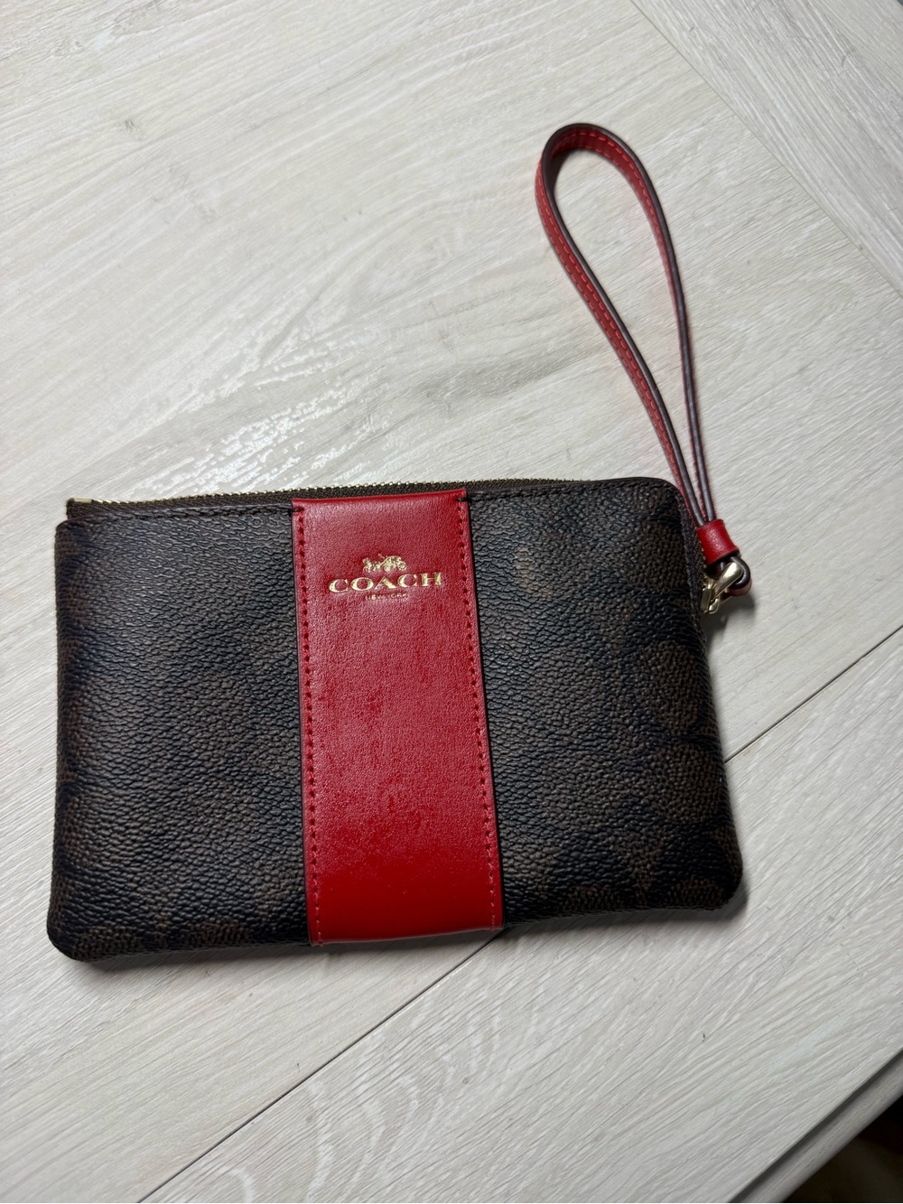 Coach Brown Signature Wristlet with Red Center Stripe